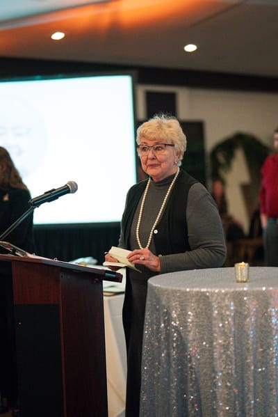 Resident giving a speech at an event
