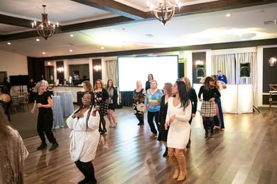 Residents dancing during a lively event in the common area