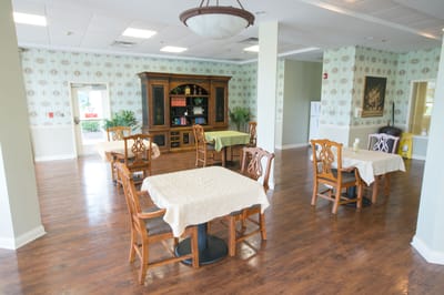 Interior dining area with tables and chairs