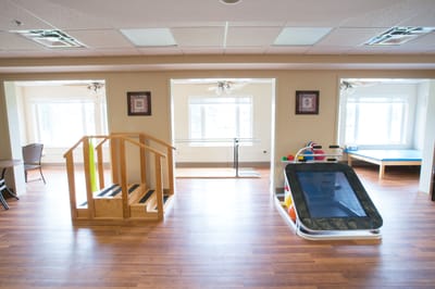 Interior view of a therapy room with equipment