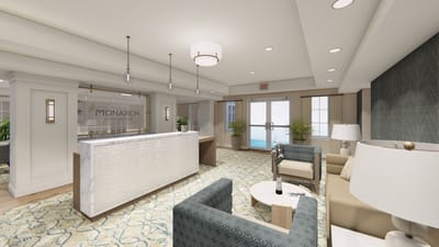 Modern lobby of a senior living facility with seating
