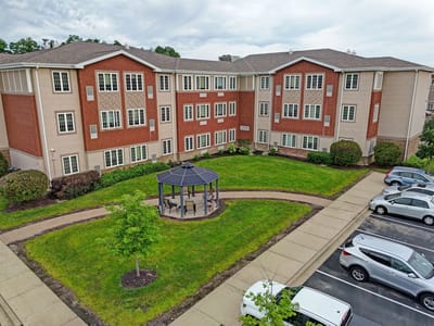 Aerial view of a supportive living facility with outdoor space