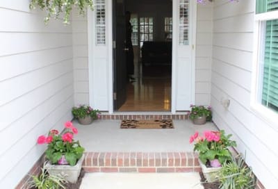 Entrance of Lynn's Care Homes with flowers