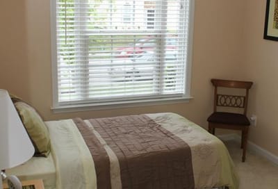 Cozy private bedroom with soft lighting