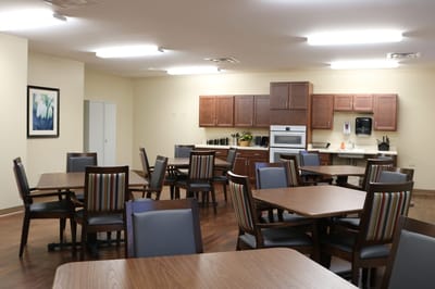 Bright dining room with tables and chairs