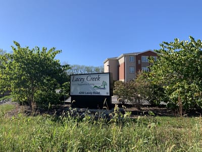 Sign for Lacey Creek Supportive Living outside the facility