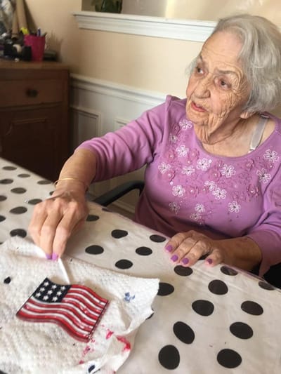 Resident engaging in an arts and crafts activity