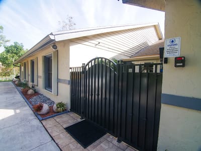 Entrance gate to Mama Llama Assisted Living facility