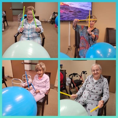Residents participating in a group activity with exercise balls