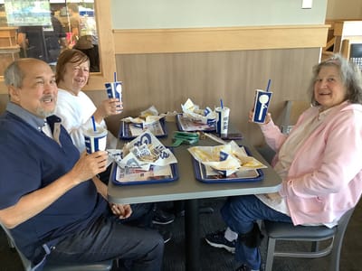 Residents enjoying a meal together in a dining area