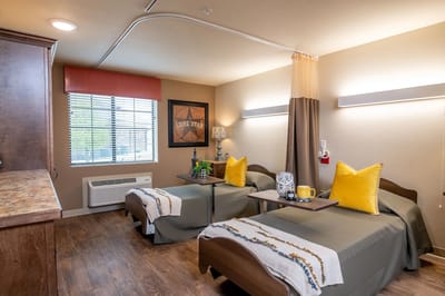 Cozy shared resident room with warm decor