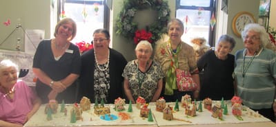 Residents engaged in a festive holiday activity