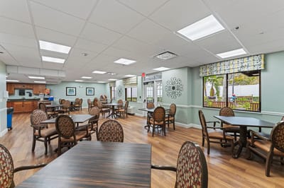 Bright dining room with tables and chairs