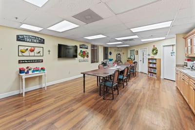 Common area with a dining table and decorations