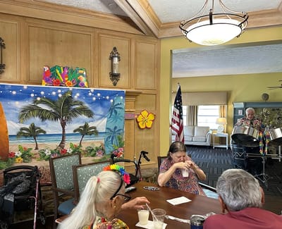 Residents enjoying live music in a common area