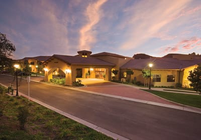 Exterior view of OakView Health Center at sunset