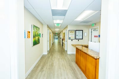 Bright interior hallway with a reception area