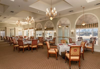 Elegant dining room with tables and chandeliers