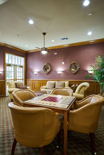 Common area with seating and a game table