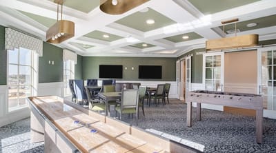 Bright common area with games and seating