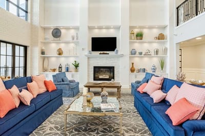 Bright lobby area with cozy seating and decor