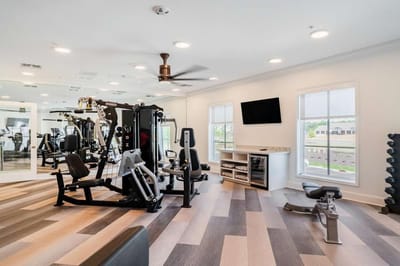 Modern fitness room with exercise equipment