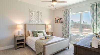 Light and welcoming private resident room with décor