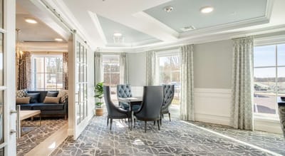 Bright common area with seating and natural light