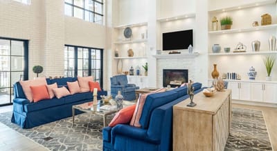 Bright and welcoming common area with sofas and decor
