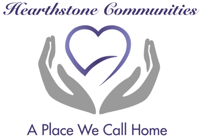 Logo of Hearthstone Communities with a heart symbol