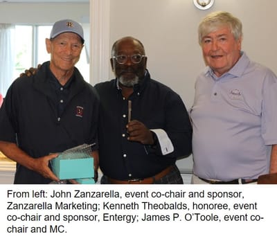 Three men at an event in a social setting.