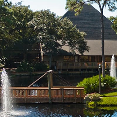 Outdoor view of the facility and water feature.