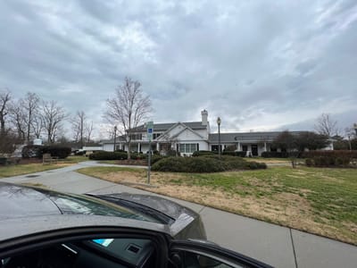 Exterior view of Hock Family Pavilion with overcast sky