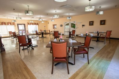 Dining area with tables and chairs arranged