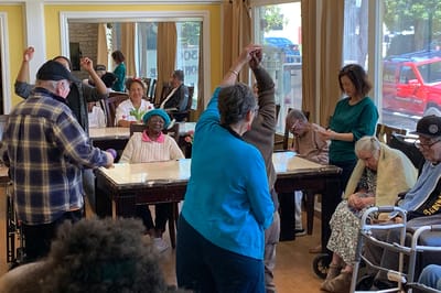 Residents engaging in a group activity in a common area
