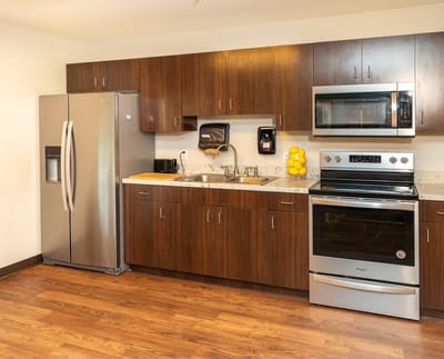 Modern kitchen space with stainless steel appliances