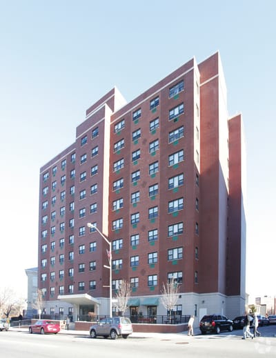 Exterior view of a multi-story assisted living facility.