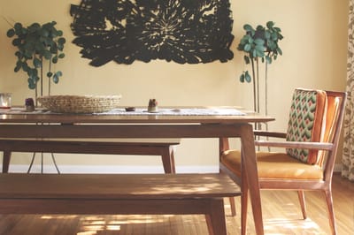 Cozy dining area with wooden table and chairs