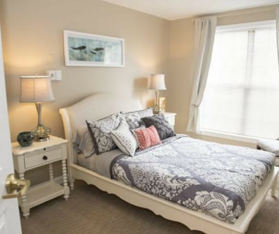 Cozy private resident room with a bed and decor