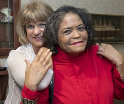 Two residents enjoying a joyful moment together