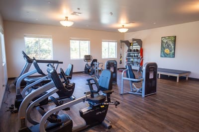 Interior view of a fitness room with exercise equipment