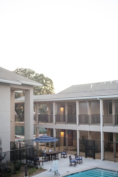 View of the outdoor space with seating and pool area