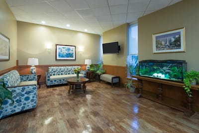 Interior common area with seating and aquarium