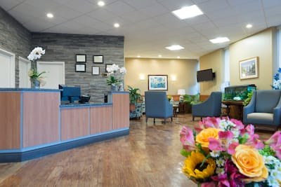 Bright and welcoming reception area with floral decor