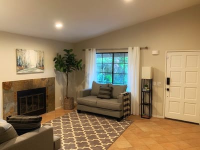 Cozy common area with seating and artwork