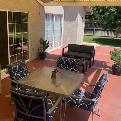 Outdoor seating area with chairs and a table