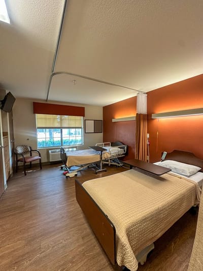 Well-furnished interior of a resident room