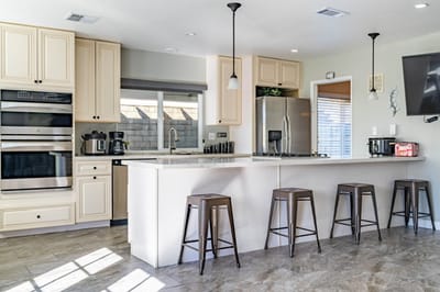 Bright kitchen area with modern design and seating