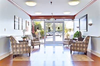 Bright lobby area with seating and natural light