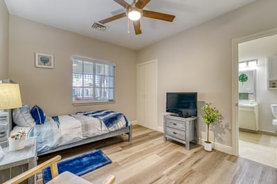 Cozy resident room with bed and TV